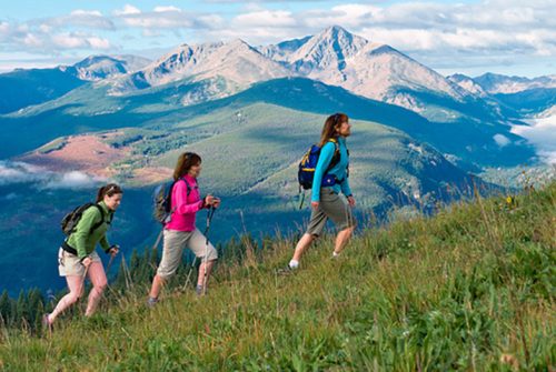 Hiking Happiness: Do Seasons and Hours Matter When Exploring Nature’s Wonders?